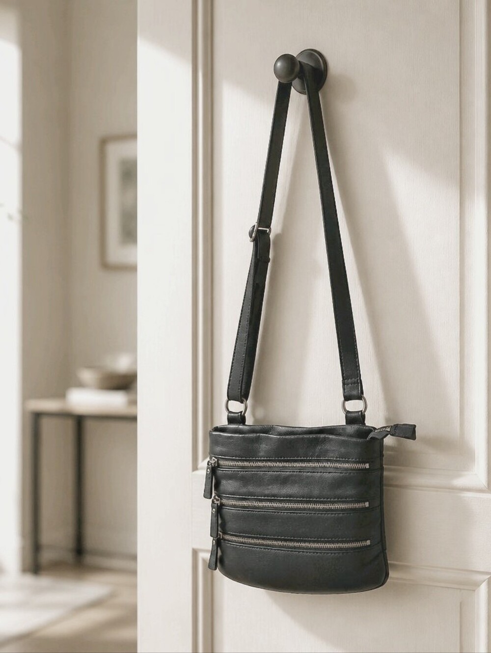 Danier Dark Navy Leather Crossbody Bag with Triple Zip Front